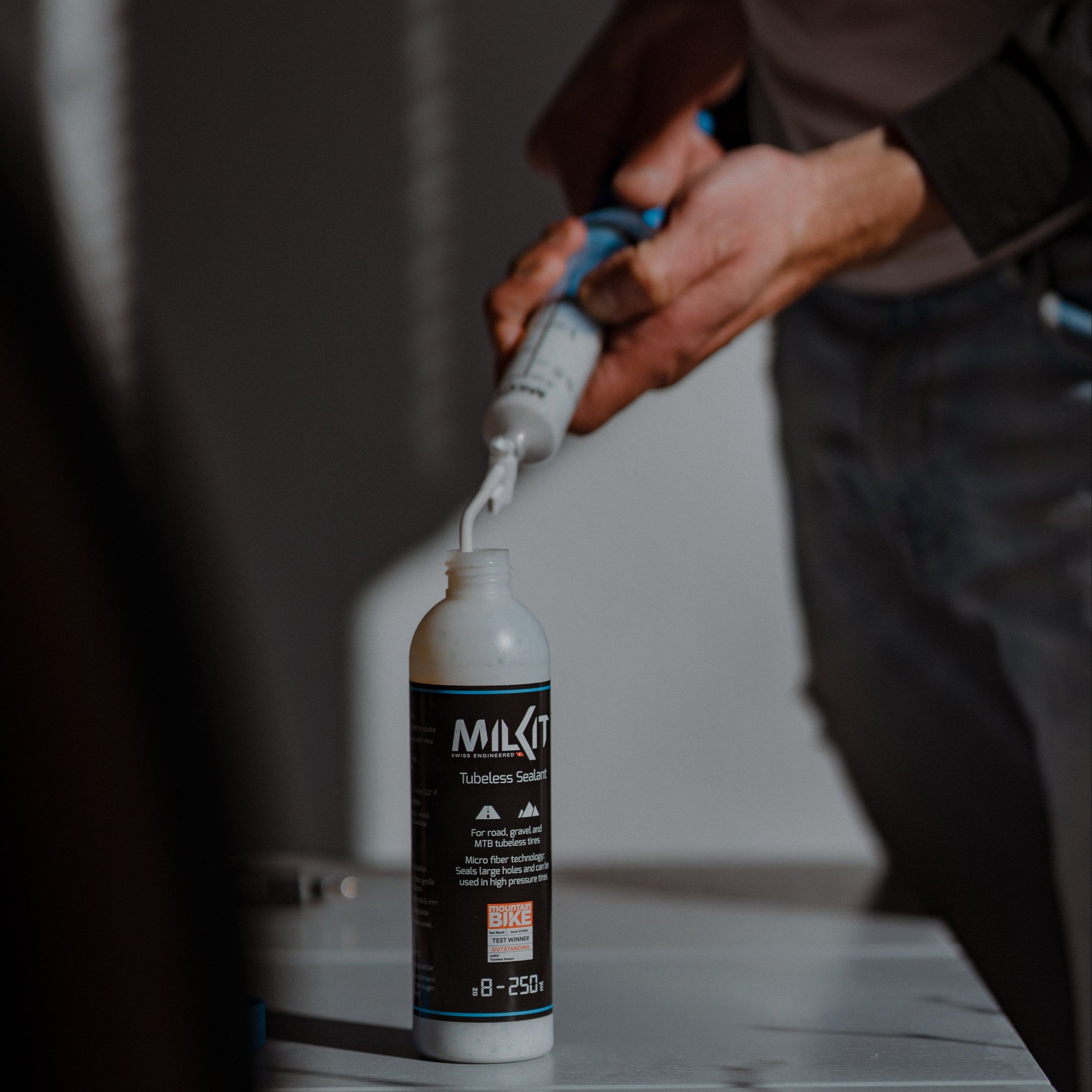 Road sealant bottle